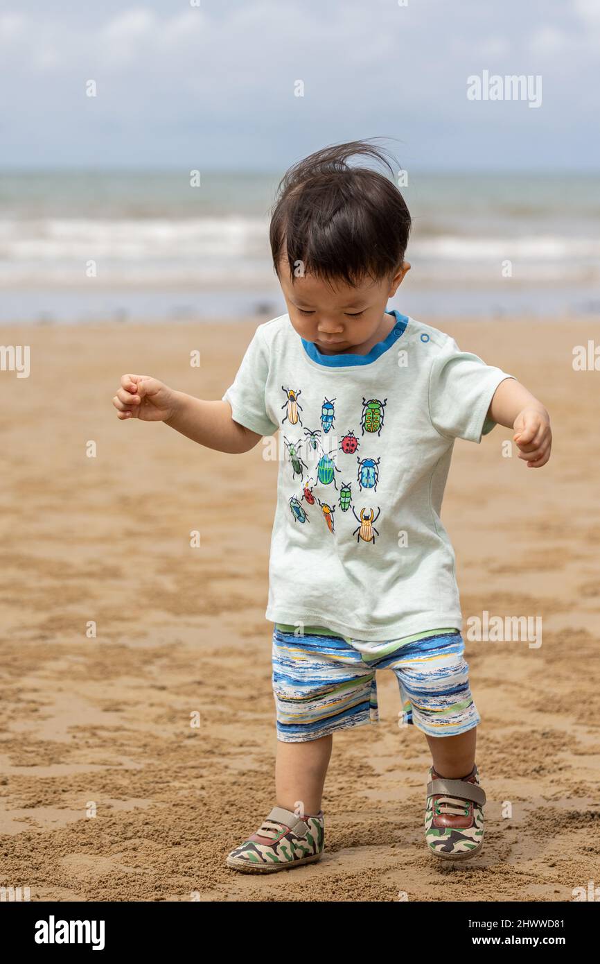 little boy have a good time at the beach Stock Photo Alamy