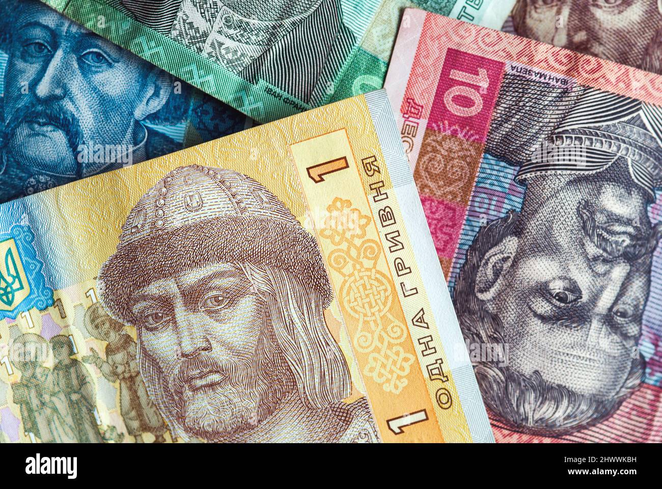 Hryvnias background, small bills texture, Ukranian money closeup Stock Photo