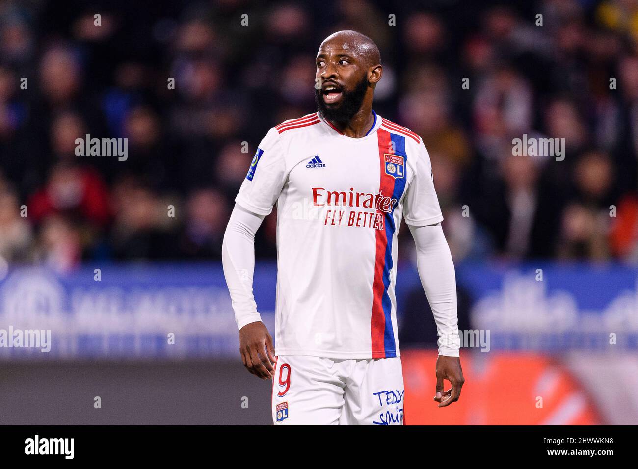 Lyon, France - February 27: Moussa Dembele of Lyon walks in the field during the Ligue 1 Uber Eats match between Olympique Lyonnais and Lille OSC at G Stock Photo