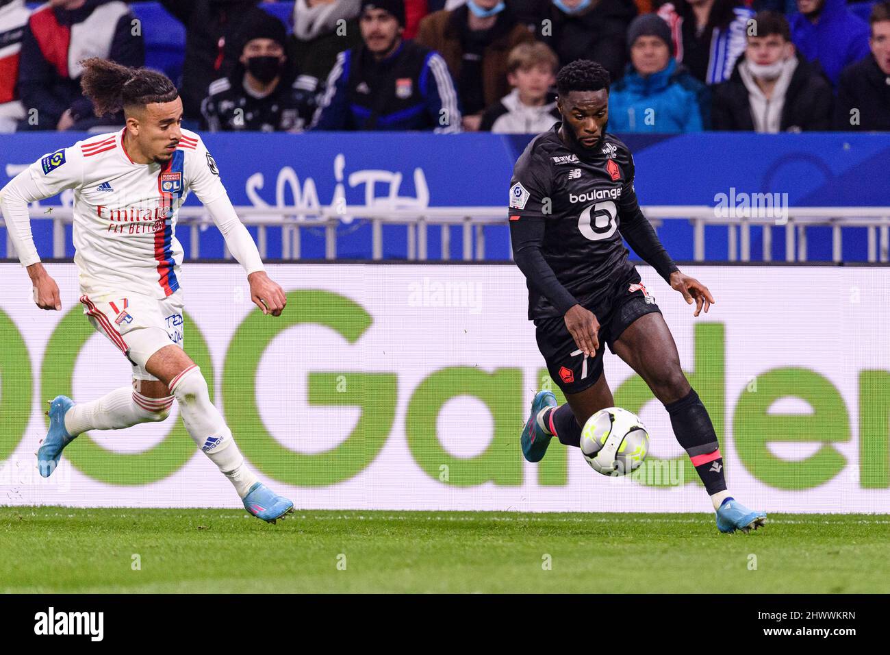 Lyon, France - February 27: Malo Gusto of Lyon (L) chases Jonathan Bamba of  Lille (R) during the Ligue 1 Uber Eats match between Olympique Lyonnais an  Stock Photo - Alamy