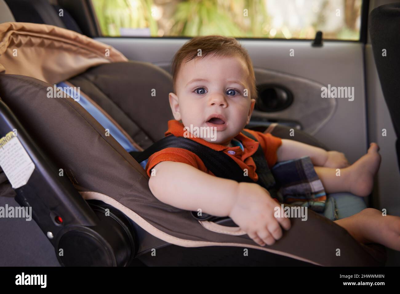 Every baby needs a carseat when traveling. Cropped shot a baby boy in a