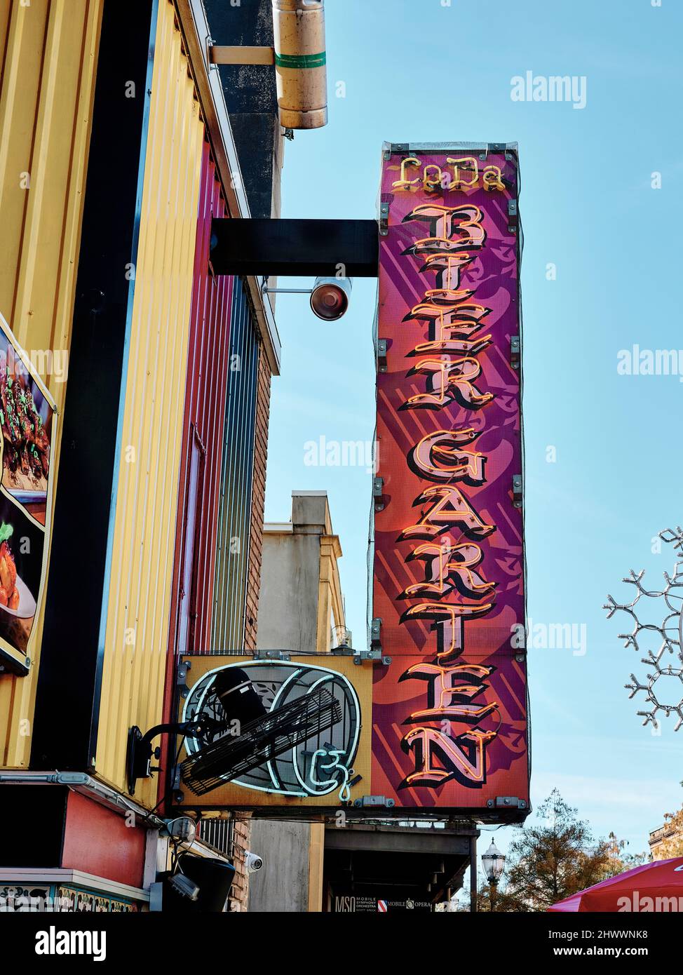 Tall neon sign for the Bier Garten bar or tavern in Mobile Alabama, USA. Stock Photo