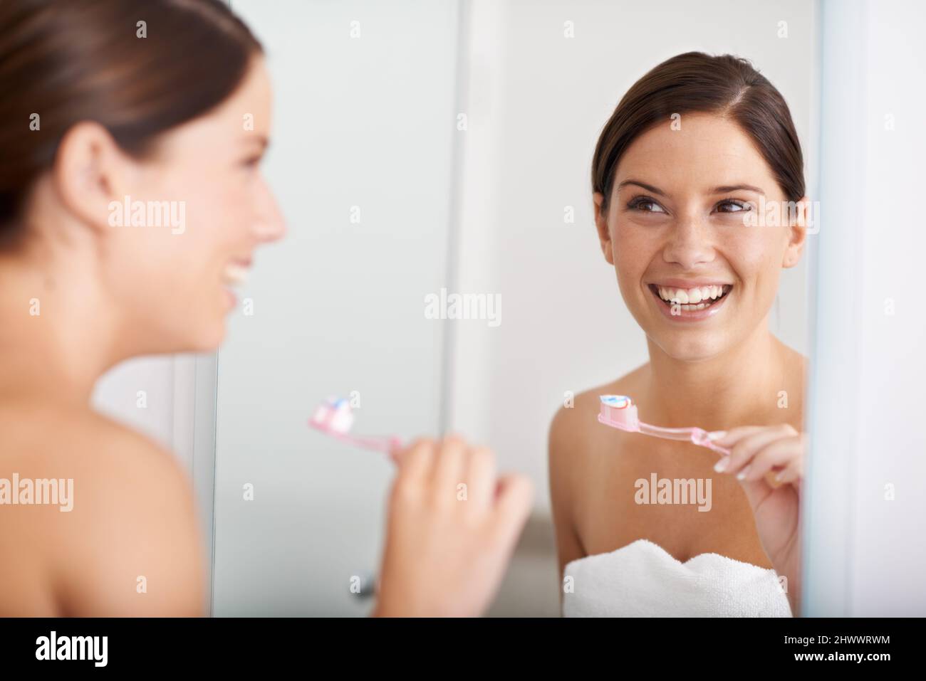 Dental health is important. A young woman standing in front of the