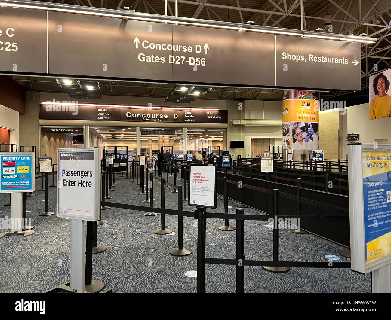 Passengers at TSA security screening line inside main terminal General Mitchell International Airport in Milwaukee, Wisconsin on a Sunday. Stock Photo