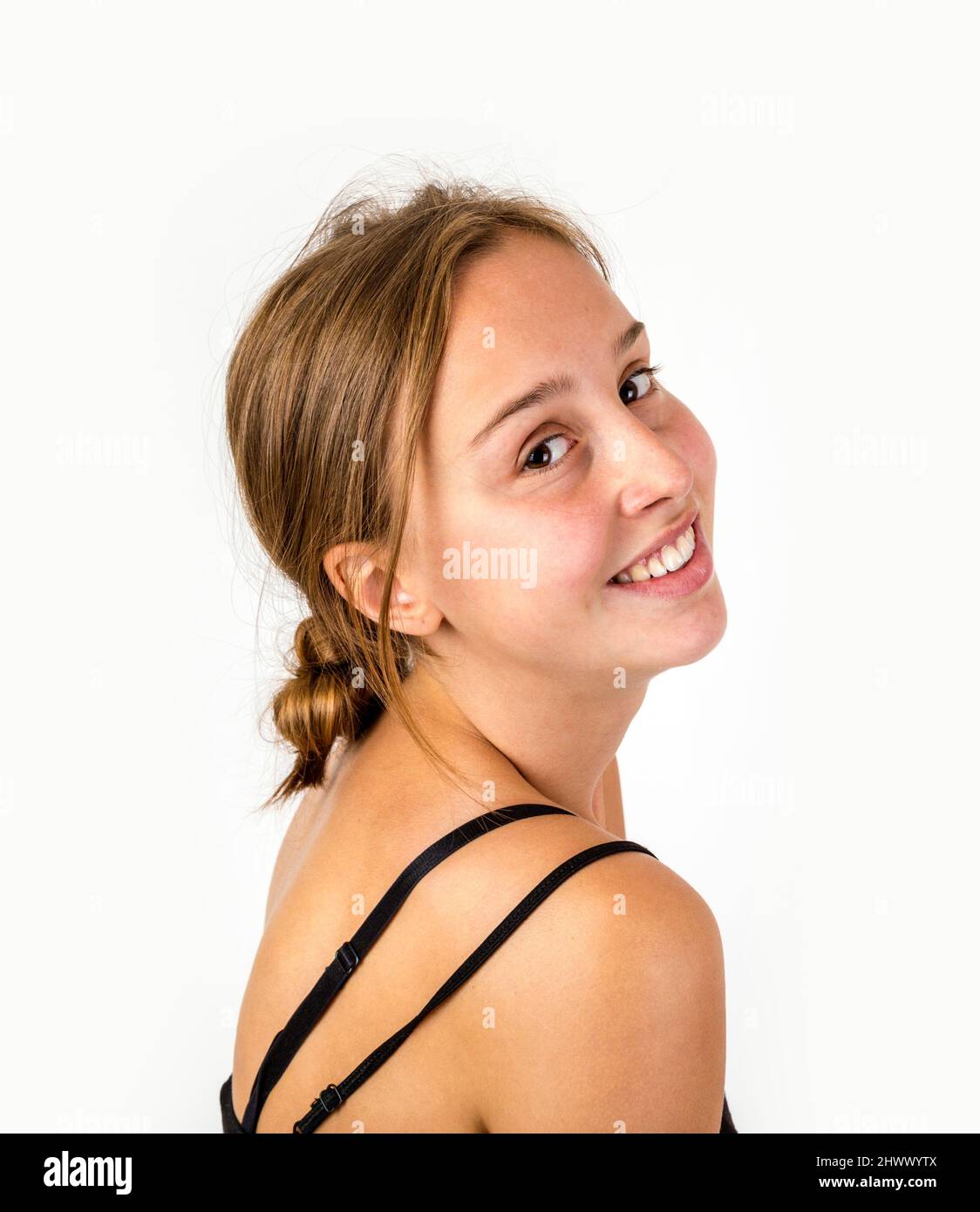 portrait of smiling young beautiful girl with brown hair Stock Photo