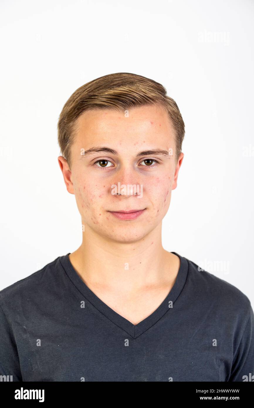 portrait of handsome teenage boy looking at the camera Stock Photo - Alamy