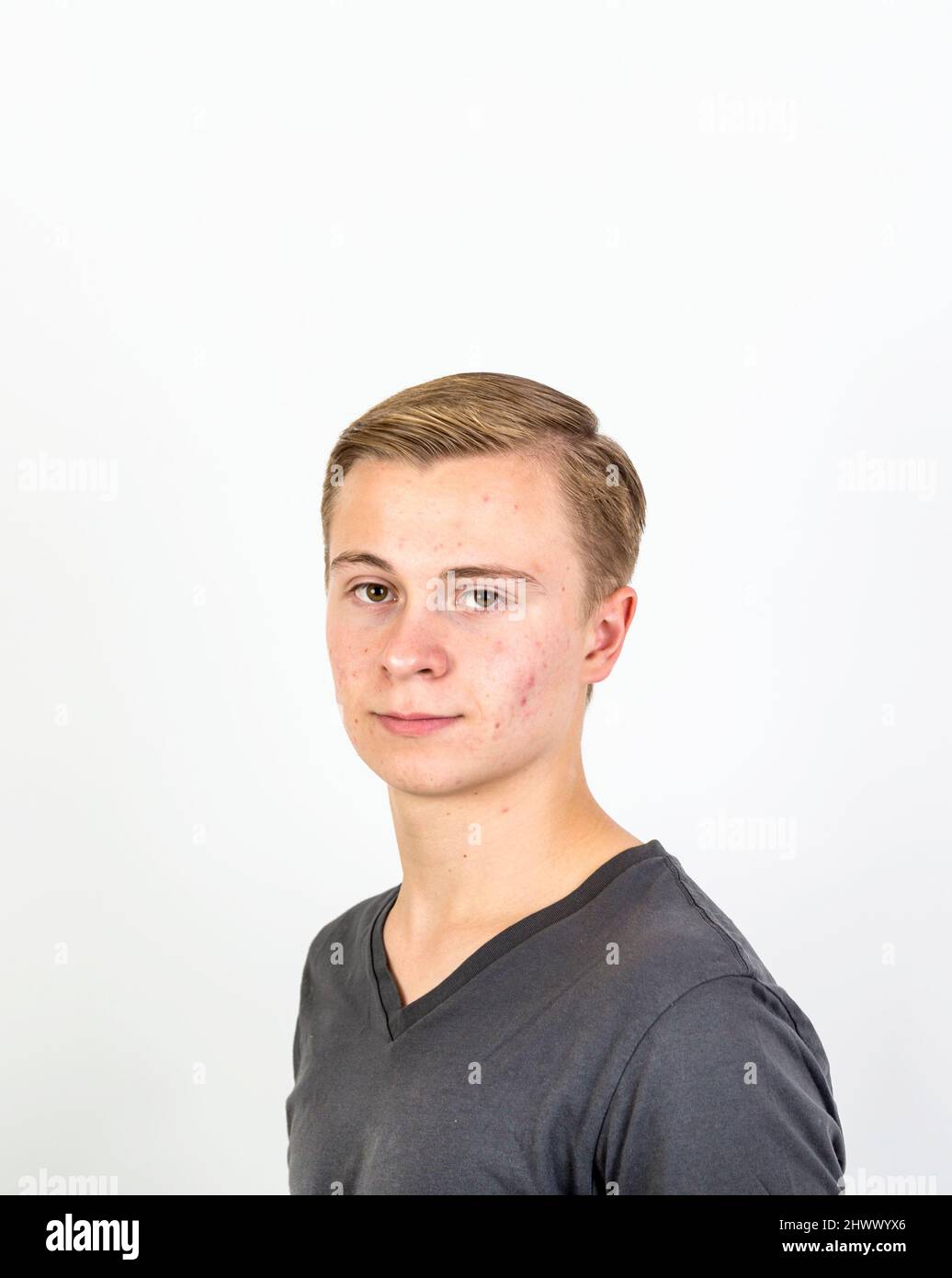 portrait of handsome teenage boy looking at the camera Stock Photo - Alamy