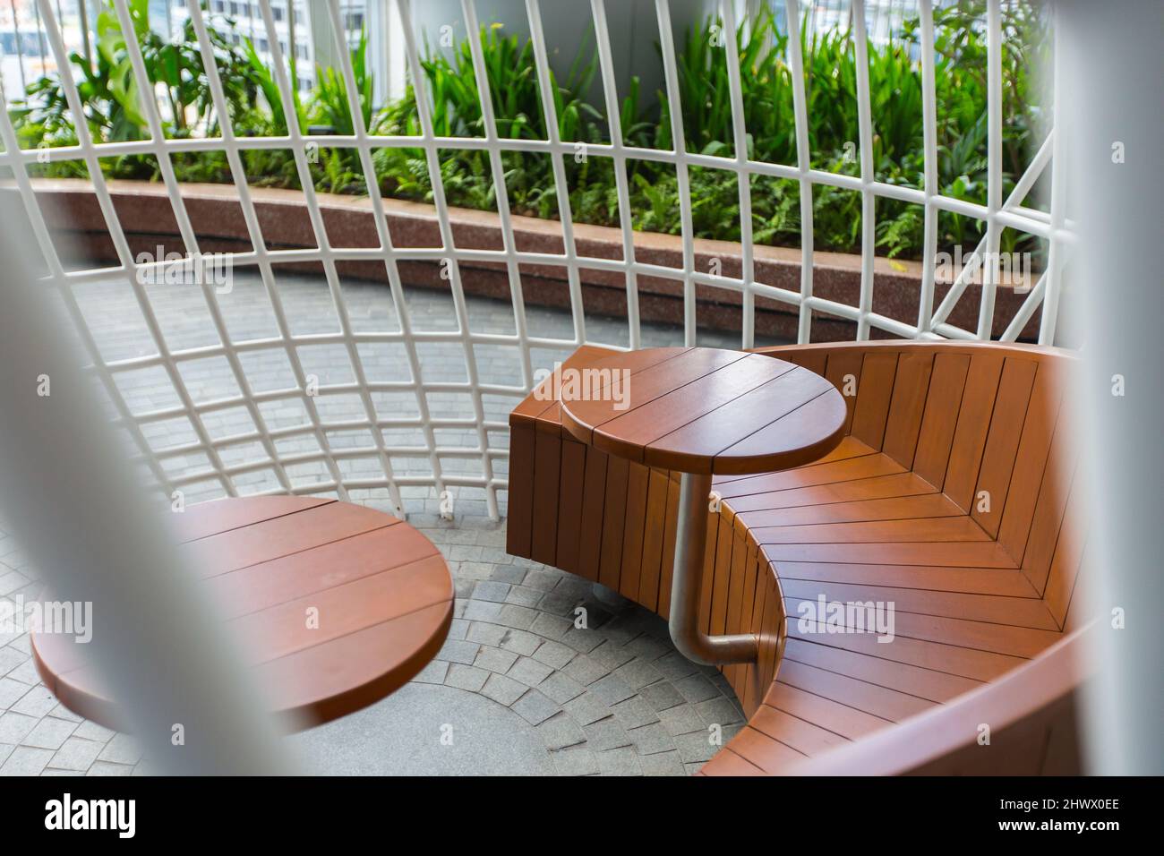 Seating area design at Oasis Garden at CapitaSpring, Singapore Stock Photo