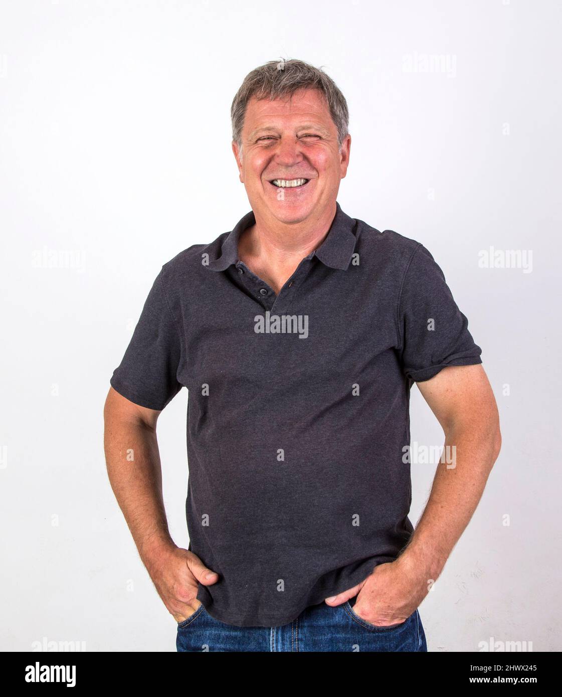 Portrait of a handsome man looking at camera Stock Photo - Alamy