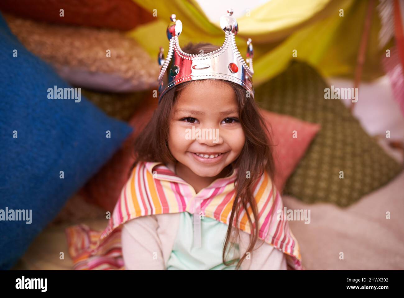 Shes a little princess. A cute little girl dressed up as a princess ...