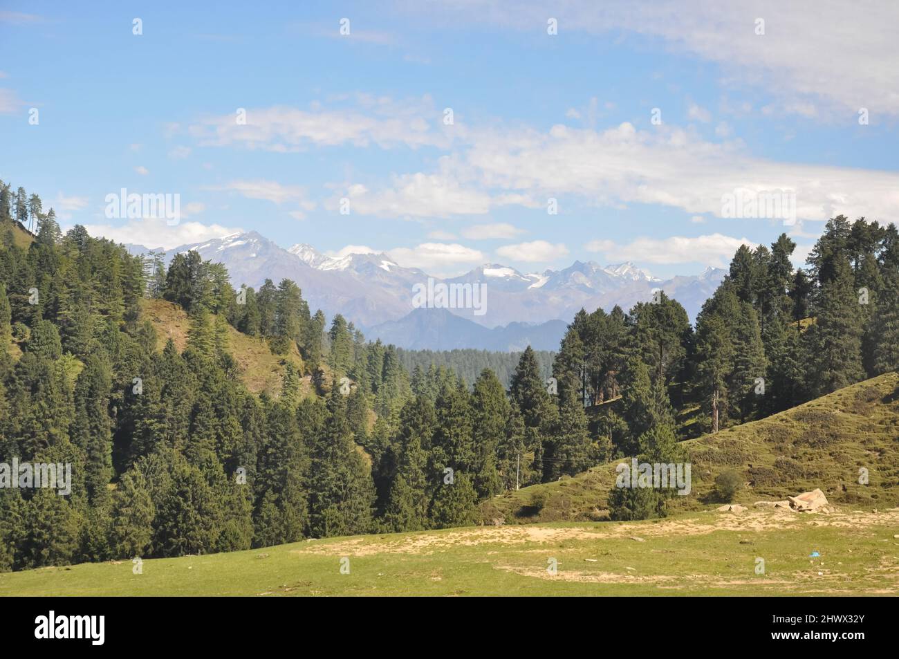 View of beautiful himalayas from in between mountains of Himachal Pradesh Stock Photo