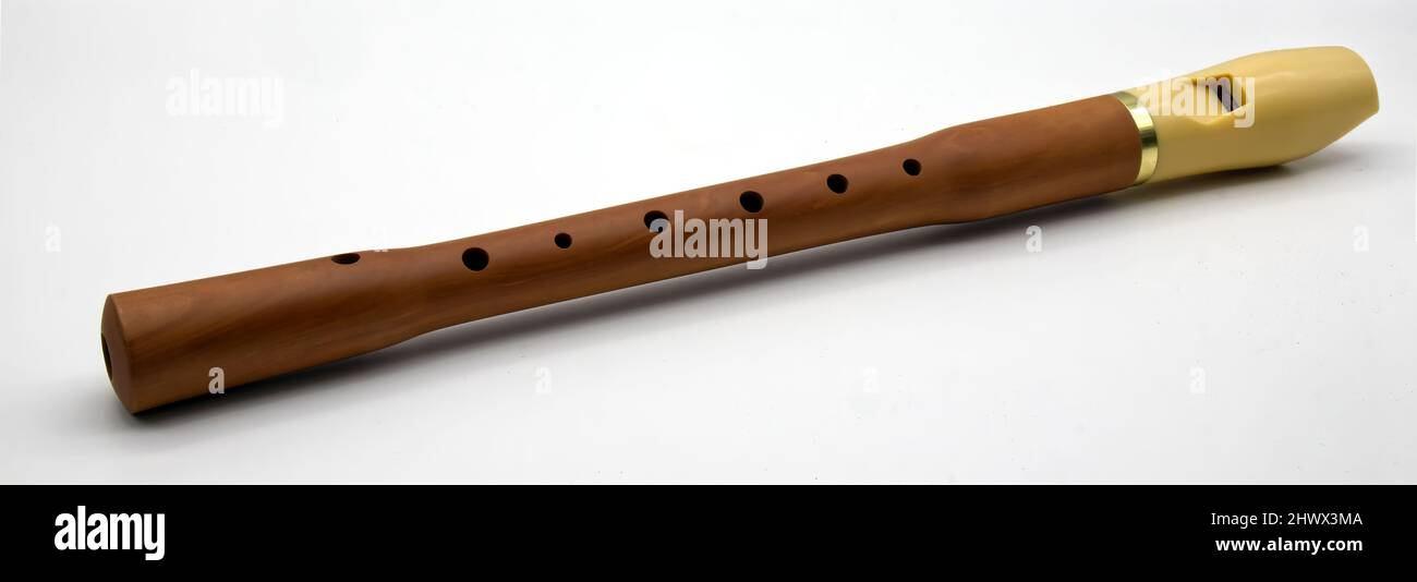 Wooden recorder flute, instrument isolated on white background Stock