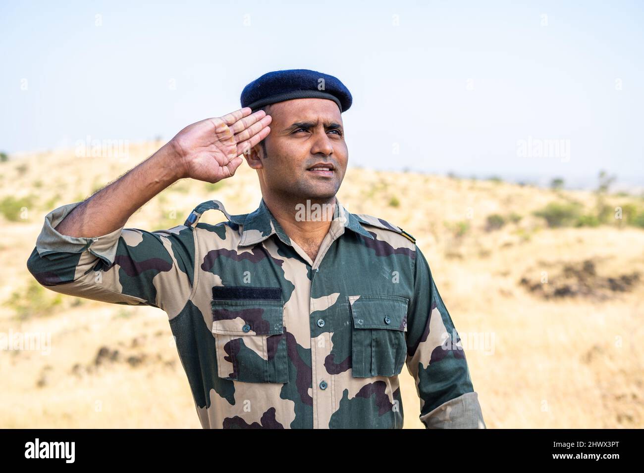 Proud man in military suit Stock Photo - Alamy