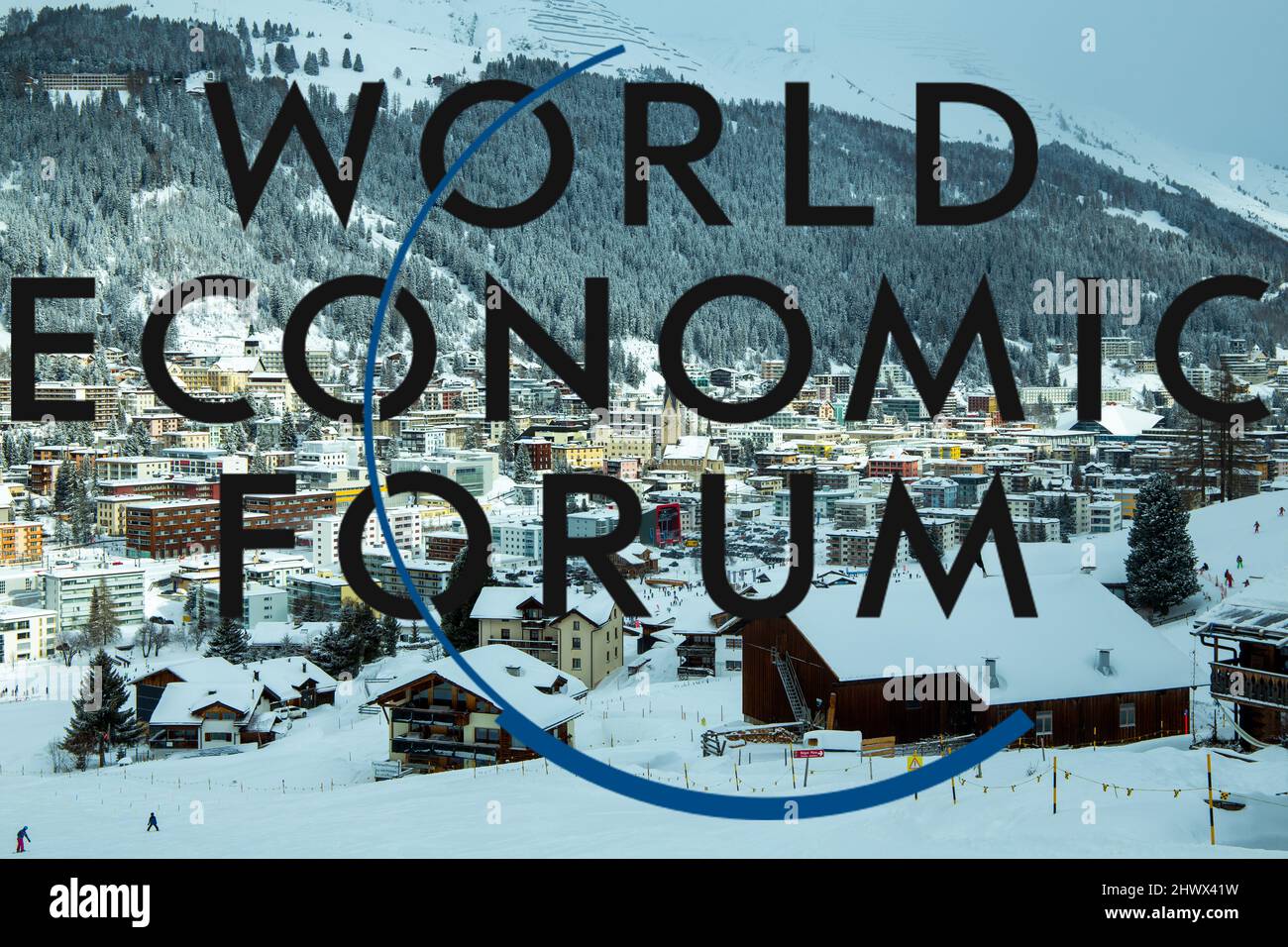 Logo of WEF (World Economic Forum), in the background Davos from above Stock Photo
