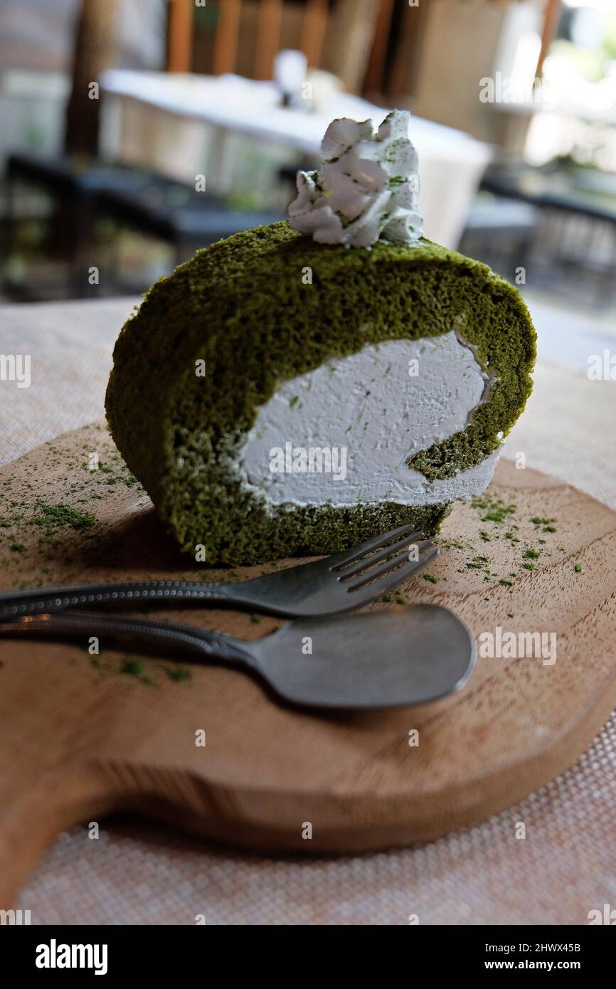 Close up Matcha Japanese green tea roll cake Stock Photo Alamy