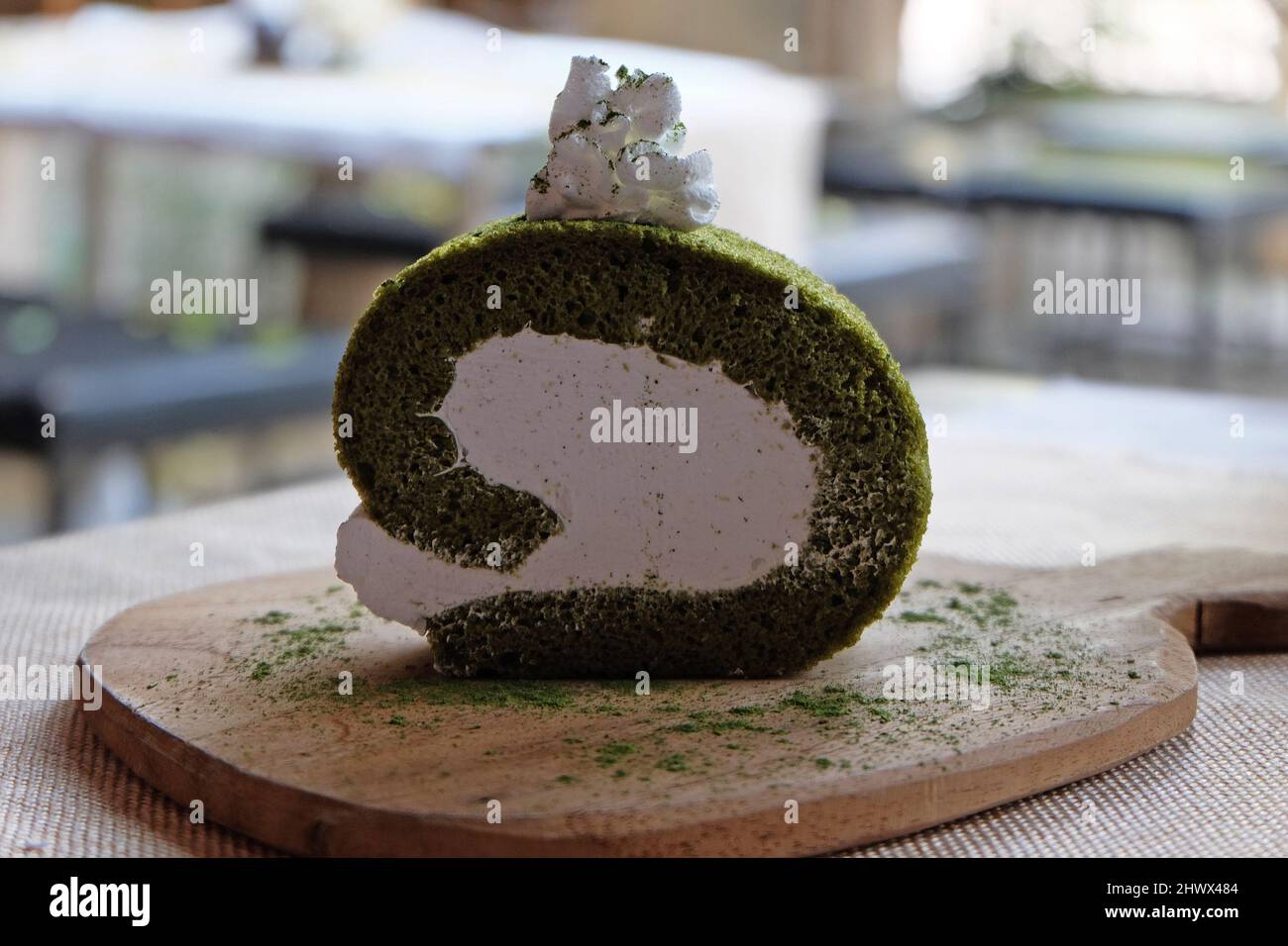 Close up Matcha Japanese green tea roll cake Stock Photo Alamy