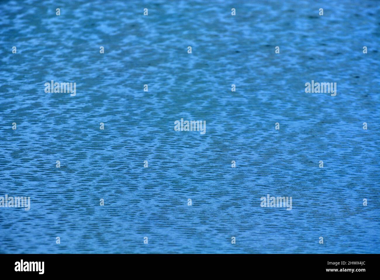 Blue sea waving water for background Stock Photo - Alamy