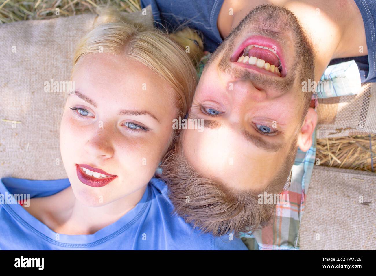 Portrait of lovely couple in love. Young sensual girlfriend glad to ...