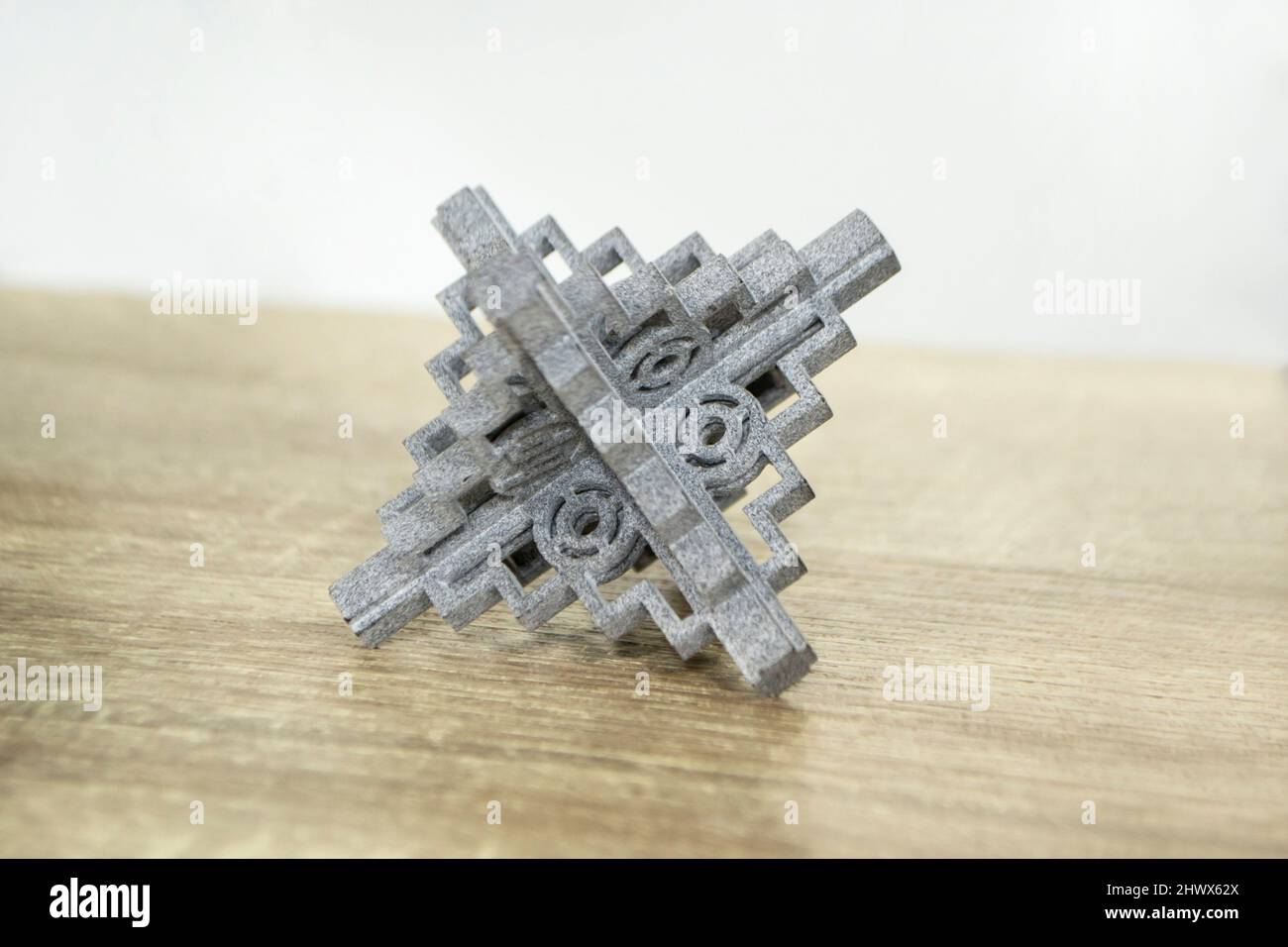 Gray abstract models printed on 3d printer from powder close-up. Stock Photo
