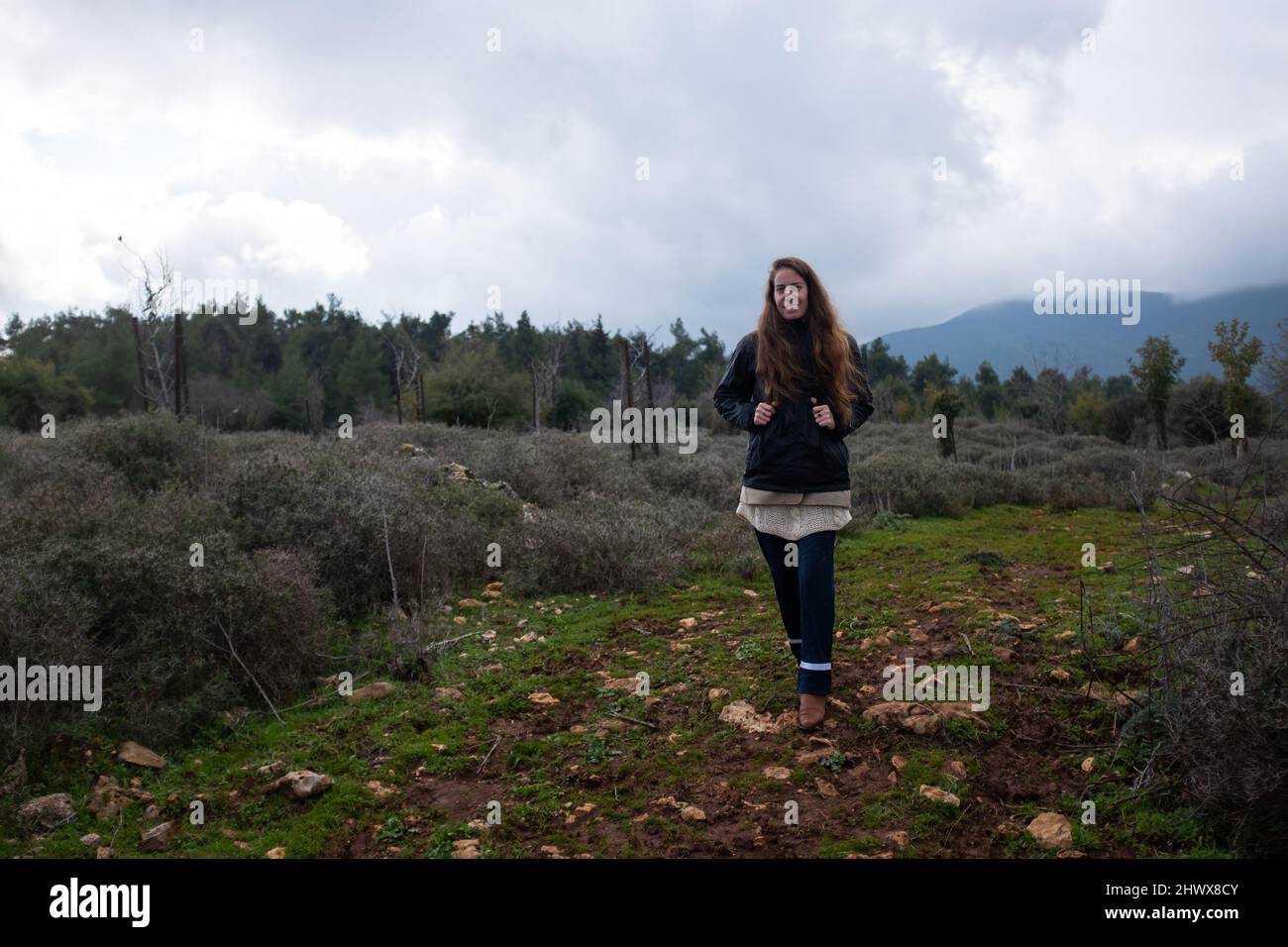 Rain jacket woman hiking hi-res stock photography and images - Alamy