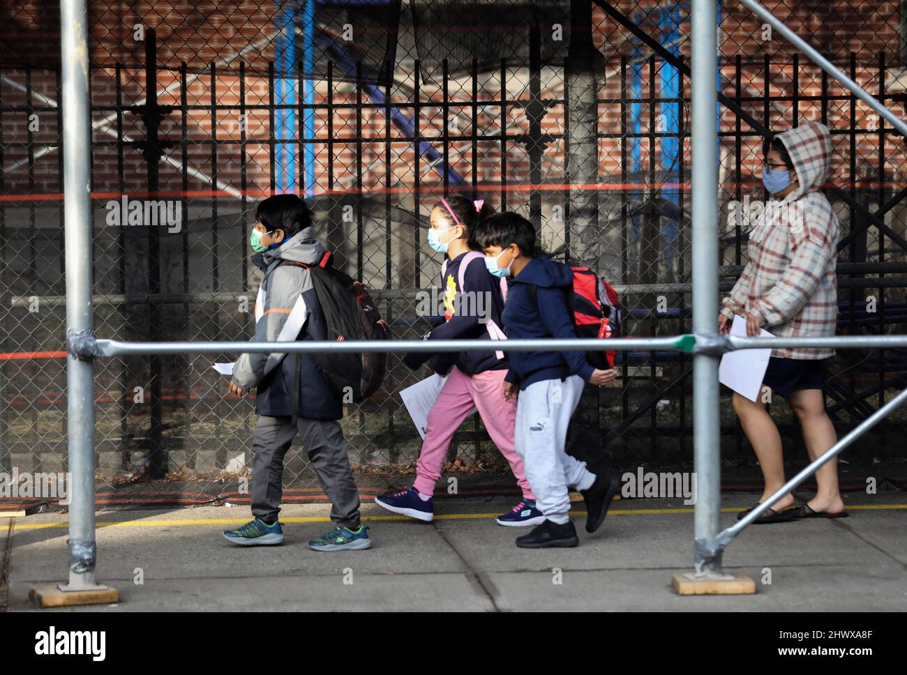 New York, USA. 7th Mar, 2022. Children go to school in New York, the United States, March 7, 2022. New York City has suspended COVID-19 vaccine passport program and remove indoor mask mandate in public schools for K-12 students starting from Monday. Credit: Wang Ying/Xinhua/Alamy Live News Stock Photo