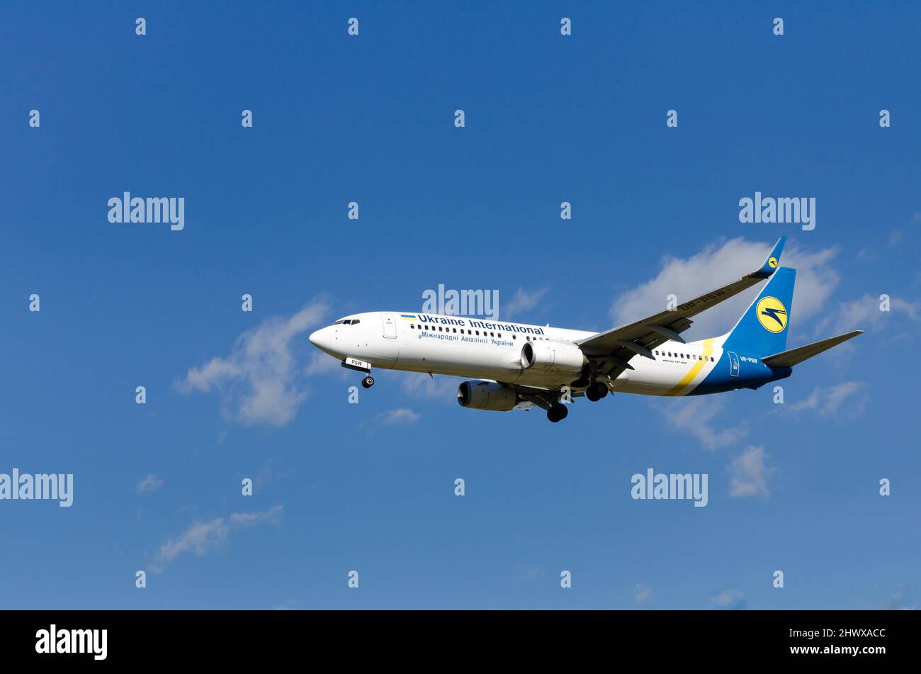 Barcelona, Spain; April 27, 2019: Boeing 737 plane of the Ukraine International airline, landing at the Josep Tarradellas airport in Barcelona-El Prat Stock Photo