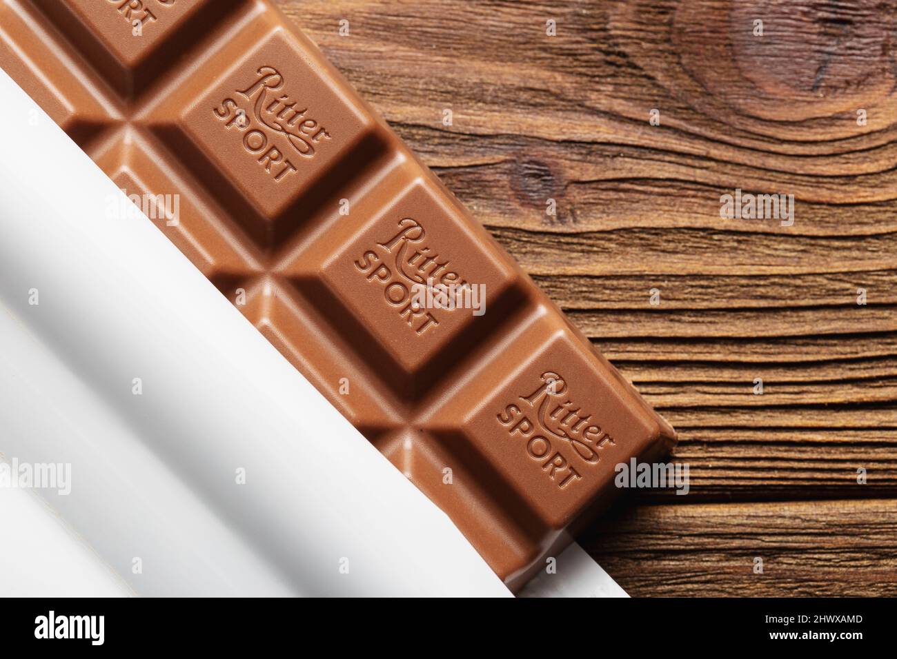 Ternopil, Ukraine - June 17, 2021: Ritter Sport milk chocolate bar close up macro on wooden background Stock Photo