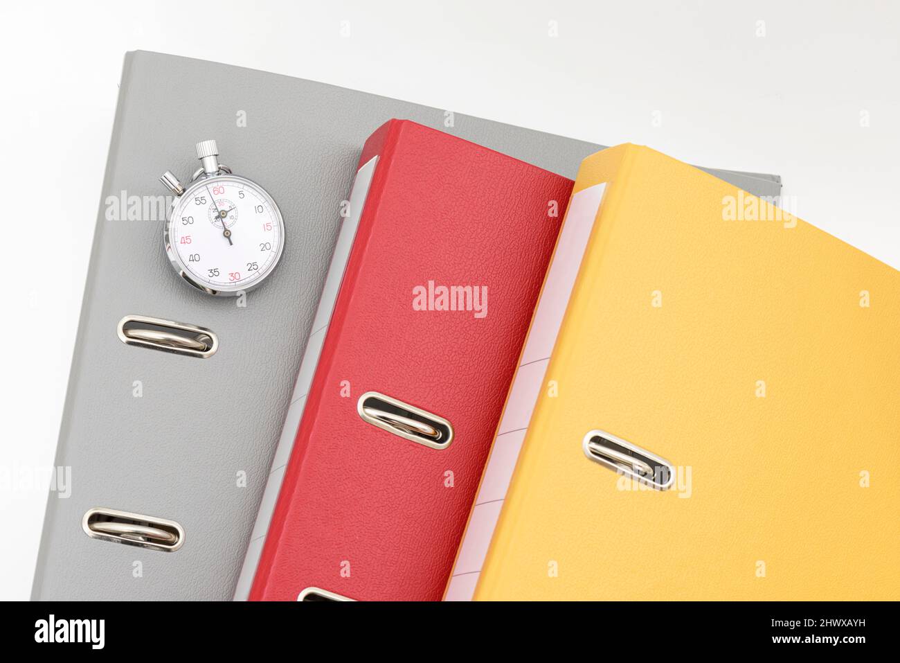 Yellow, red and gray office folders on the white background Stock Photo ...