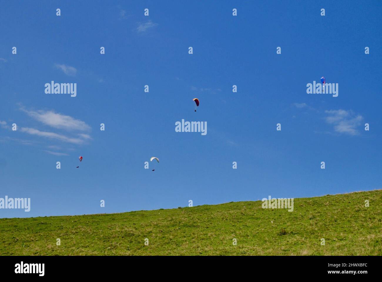 Paragliders in the sky at Niedere in Bregenzerwald. Vorarlberg, Austria. High quality photo Stock Photo