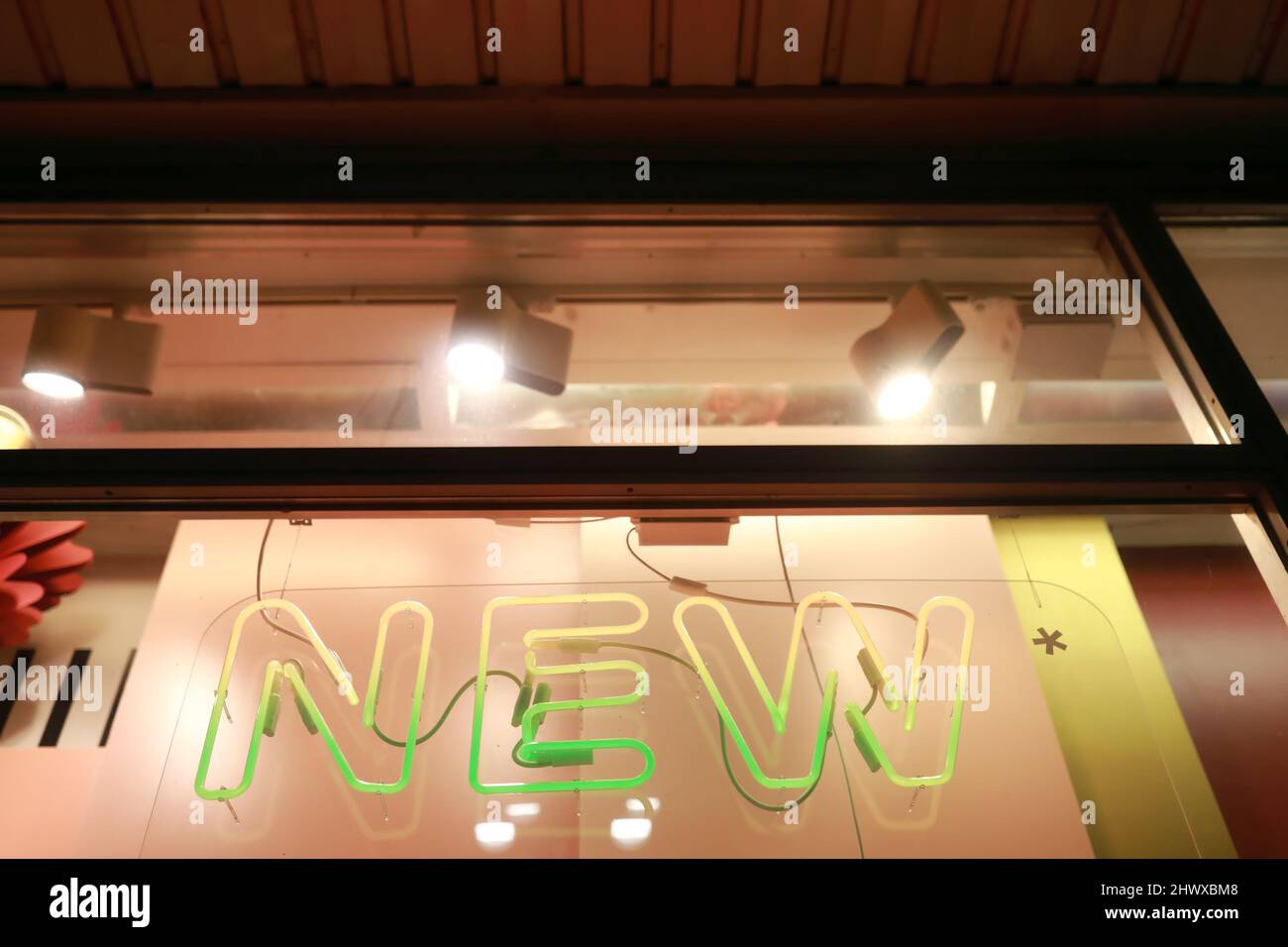 View of new sign on window of building Stock Photo - Alamy