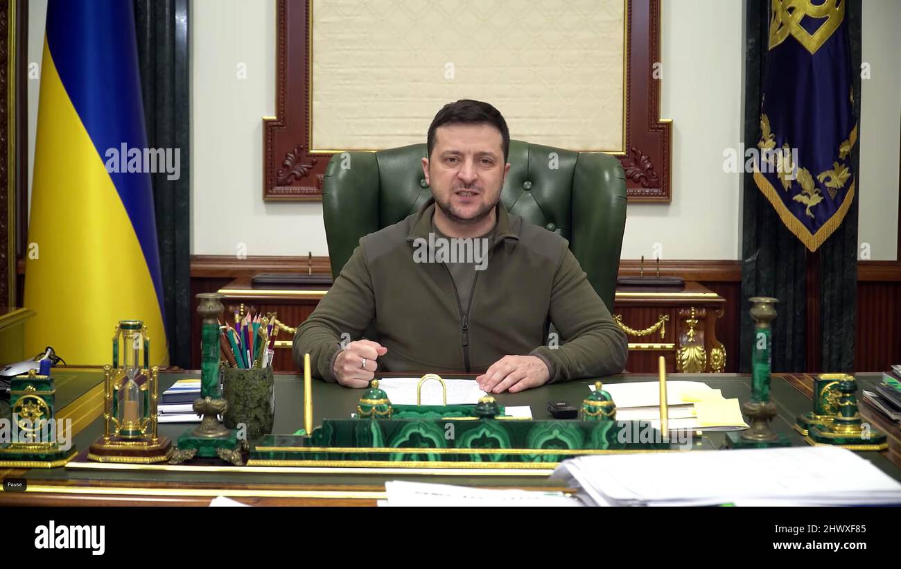 Pic shows: Defiant Ukrainian President Volodymyr Zelenskyy (Zelensky Zelenskiy) gives an address from his Kyiv office  today on Tuesday 8.3.22  with t Stock Photo