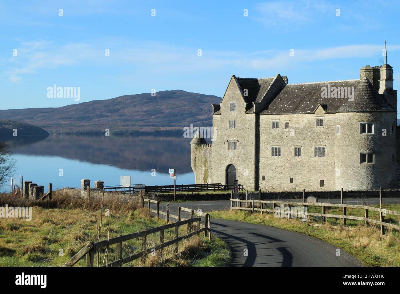 Landscape at Kilmore, County Leitrim, Ireland featuring Parke's Castle, a 17th century castle on shores of Lough Gill with Killery Mountain visible Stock Photo