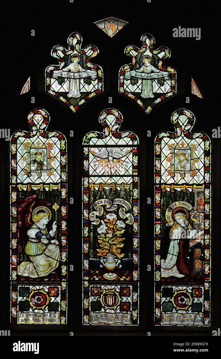 A stained glass window by the Kempe Studios. depicting The Annunciation