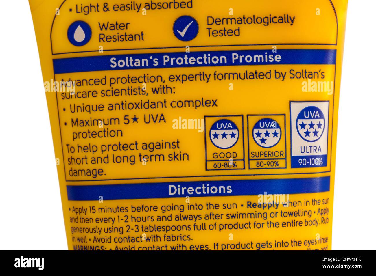 Boots Soltan protect & moisturise Suncare Lotion - Soltan's Protection Promise and directions on back of bottle Stock Photo