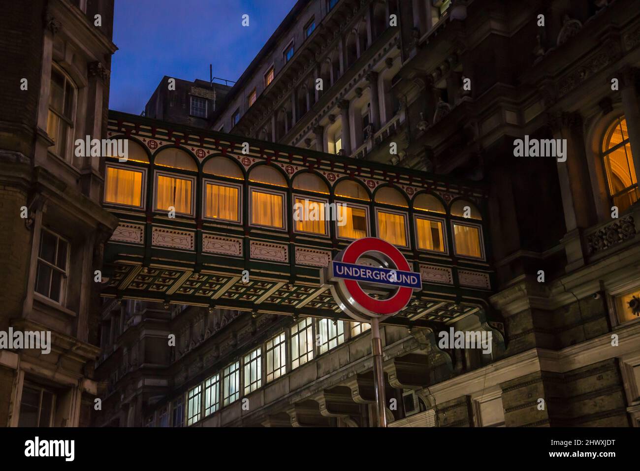 Charing Cross Underground sign and the Clermont hotel bridge crossing the street in Villiers Street, London, England, UK Stock Photo