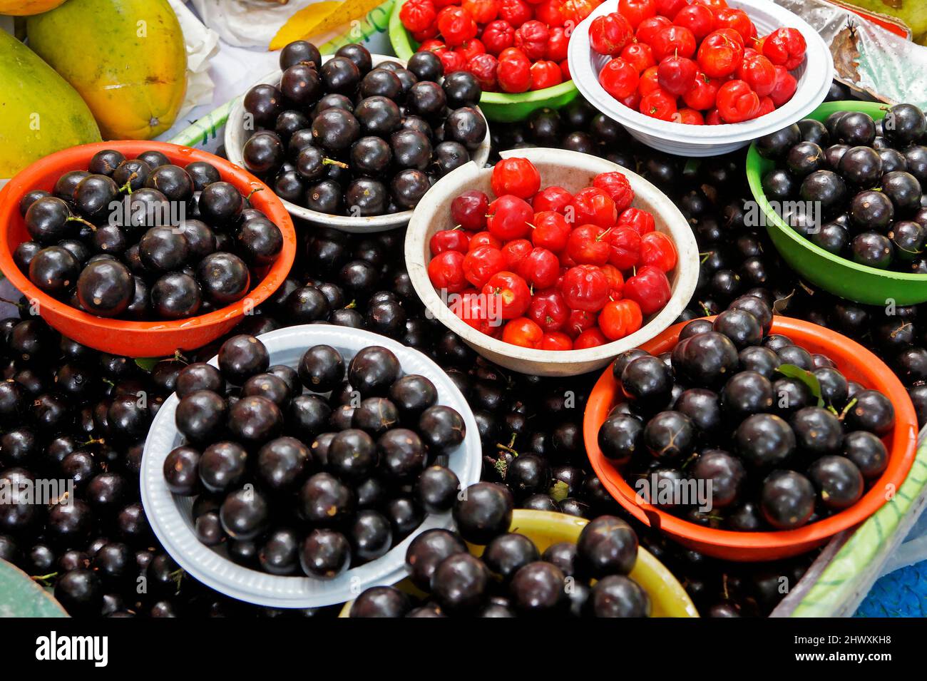 Acerola cherries and Brazilian grapetree fruits on marketplace in
