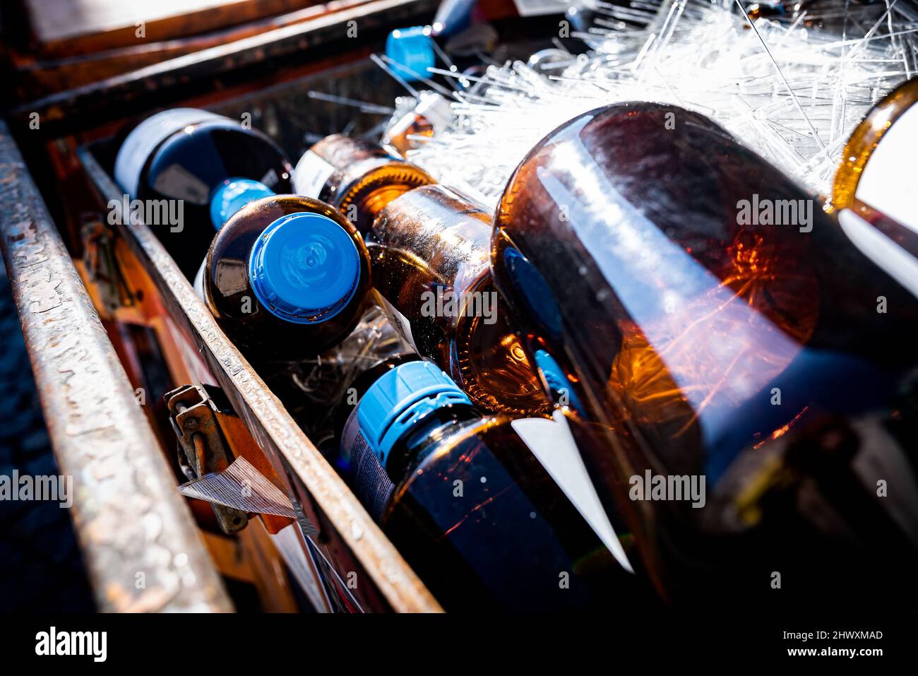 Glass bottles containing waste chemicals, waste management concept