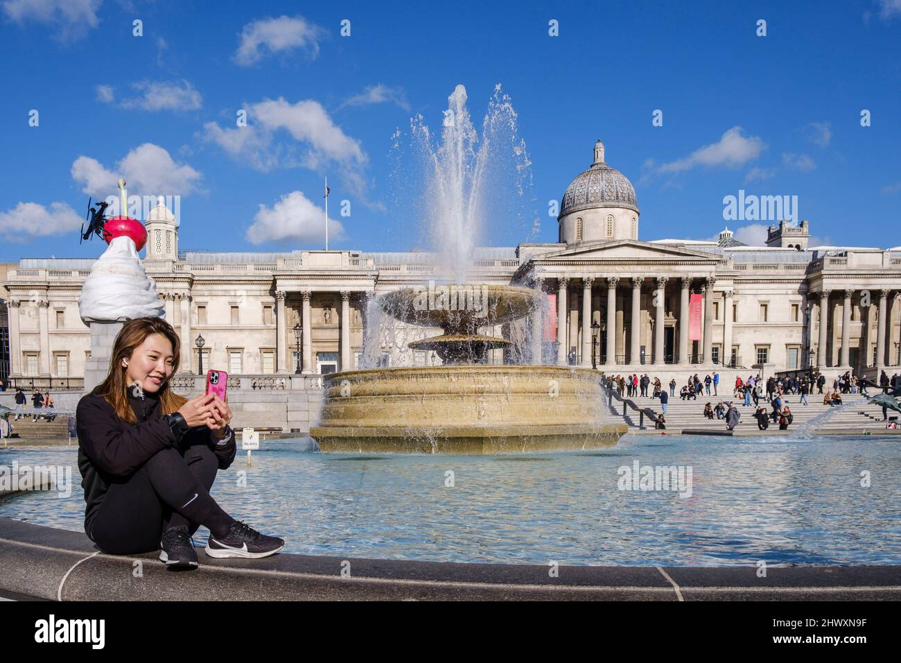 Trafalgar Square, taking a selfie at the fountain, London, England