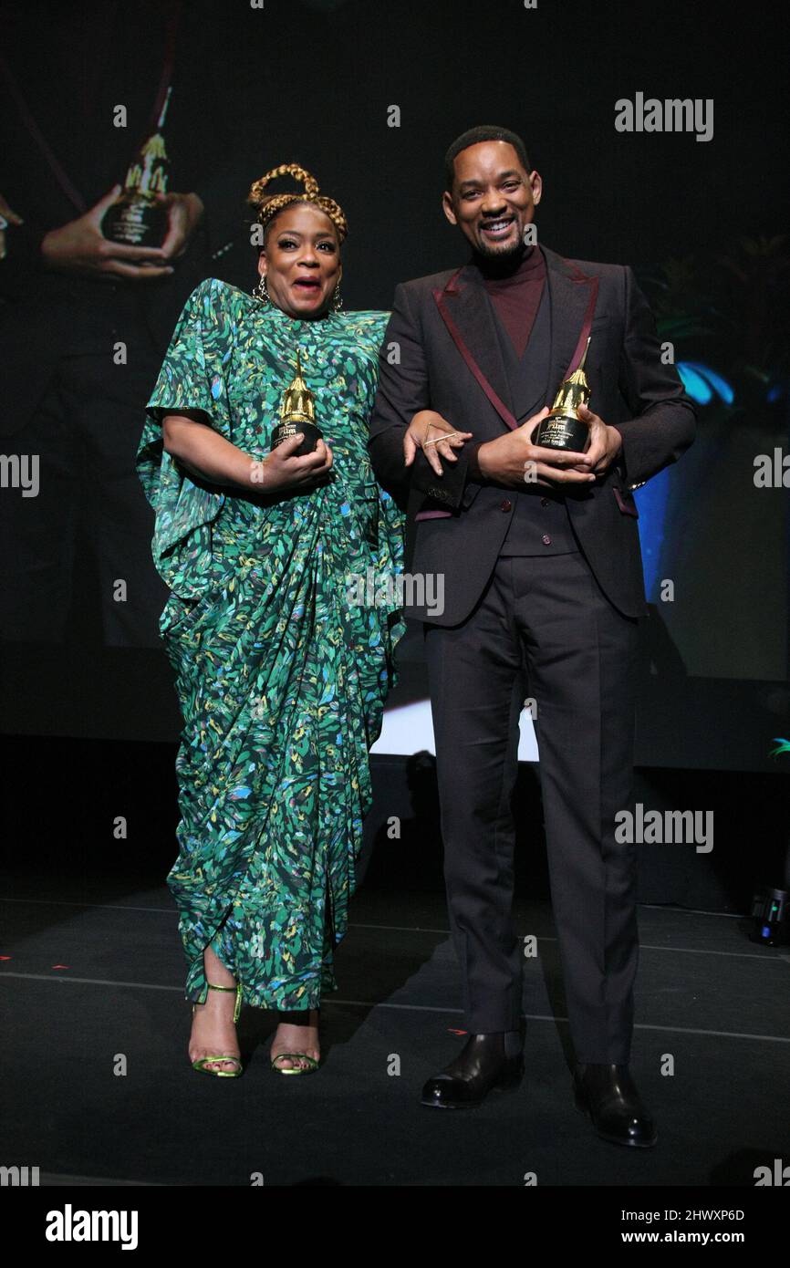 Will Smith and Aunjanue Ellis seen onstage at the Outstanding Performers of the Year Award tribute during the 37th Annual Santa Barbara International Film Festival at Arlington Theatre on March 6, 2022 in Santa Barbara, California. Photo: CraSH/imageSPACE/MediaPunch Stock Photo