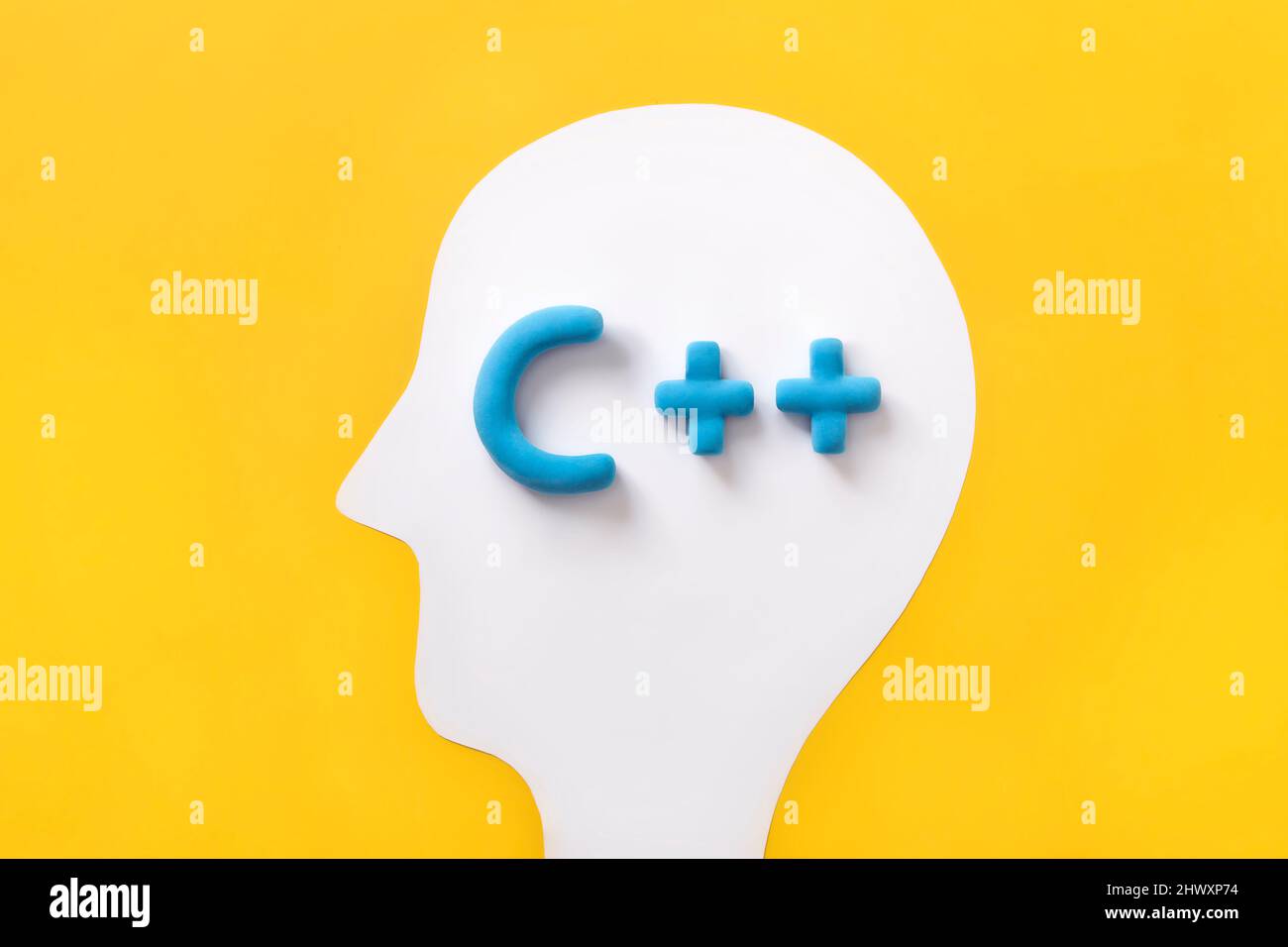 C++ programming language sign inside a humans head. Concept of ...