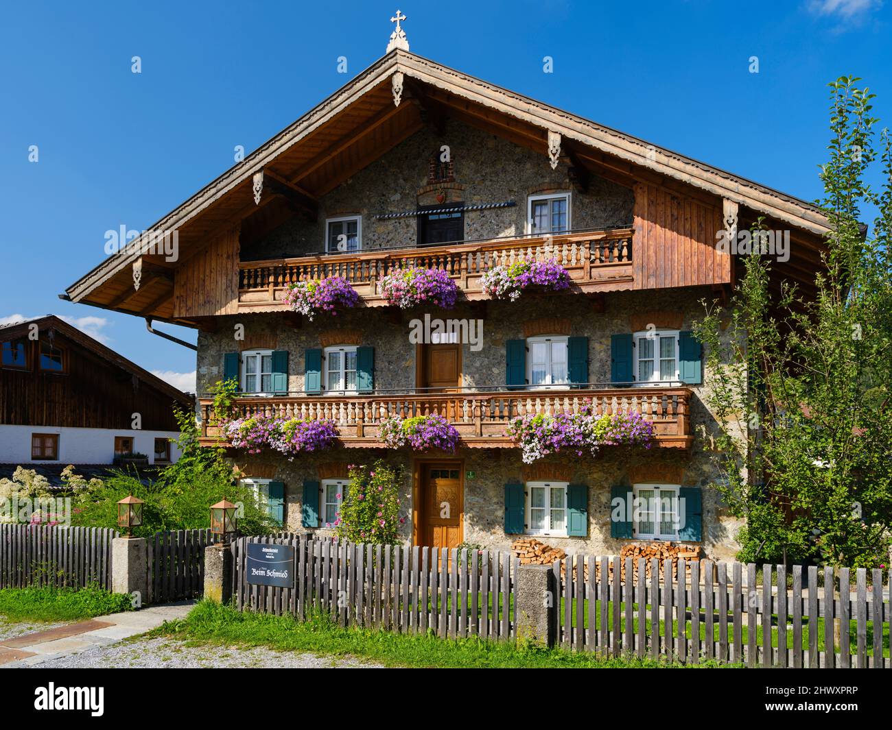 Typical house of the Chiemgau district in village Nussdorf, valley of the Inn near Rosenheim. Bavaria, Germany Stock Photo