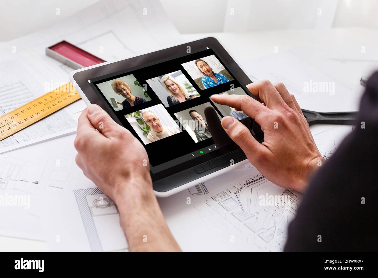 Closeup of a woman talking through video chat on tablet. communicating tablet in video chat through webcam. Stock Photo