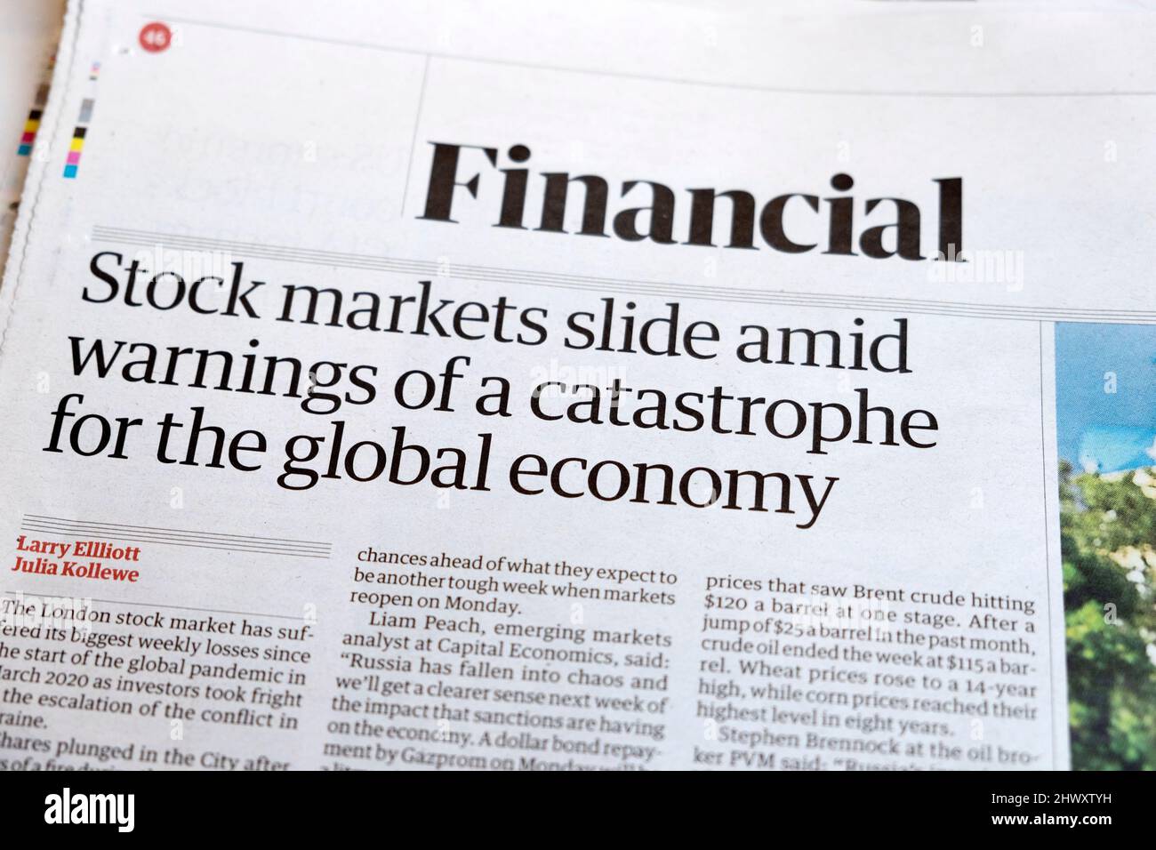 'Stock markets slide amid warnings of a catastrophe for the global economy' Financial Guardian newspaper headline clipping page 5 March 2022 London UK Stock Photo