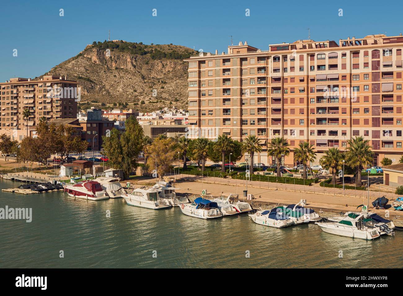 boats at the mouth of the Jucar river in Cullera, Valencia, Spain Stock Photo