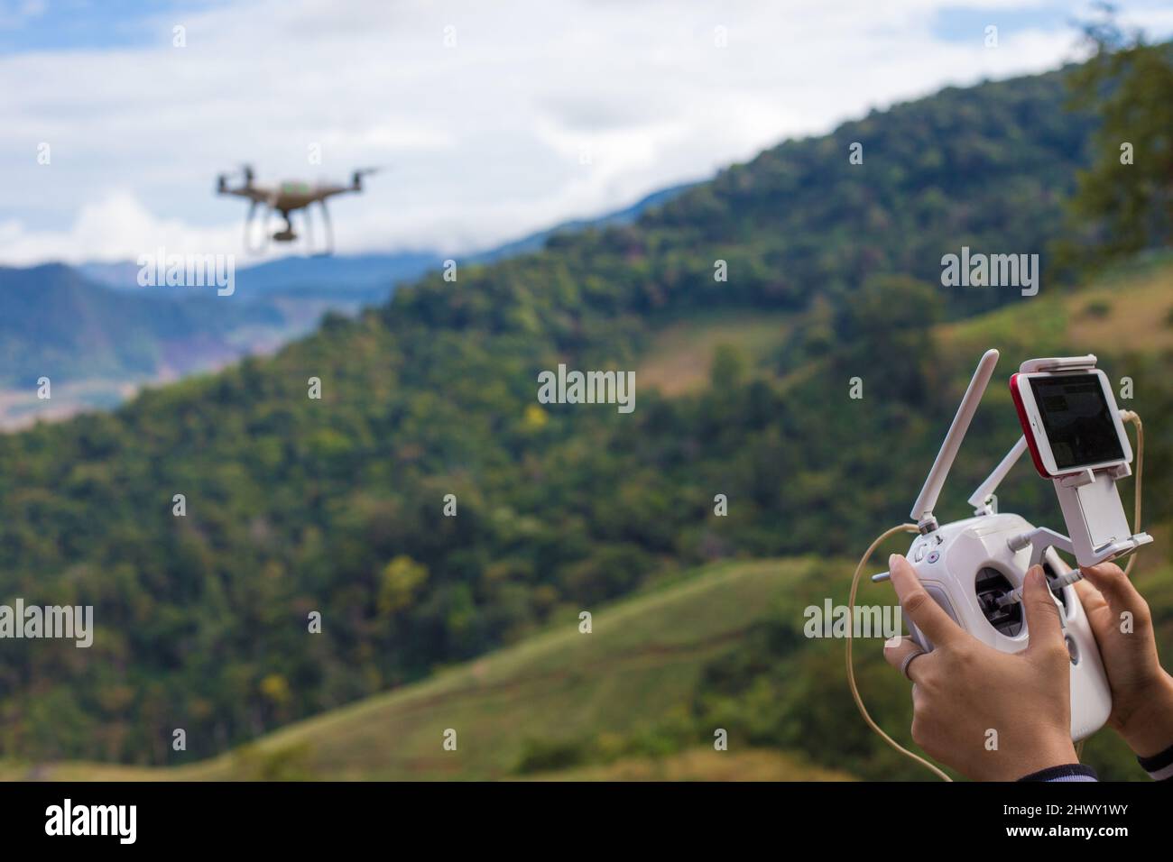 Flying drones in the forest hi-res stock photography and images - Alamy