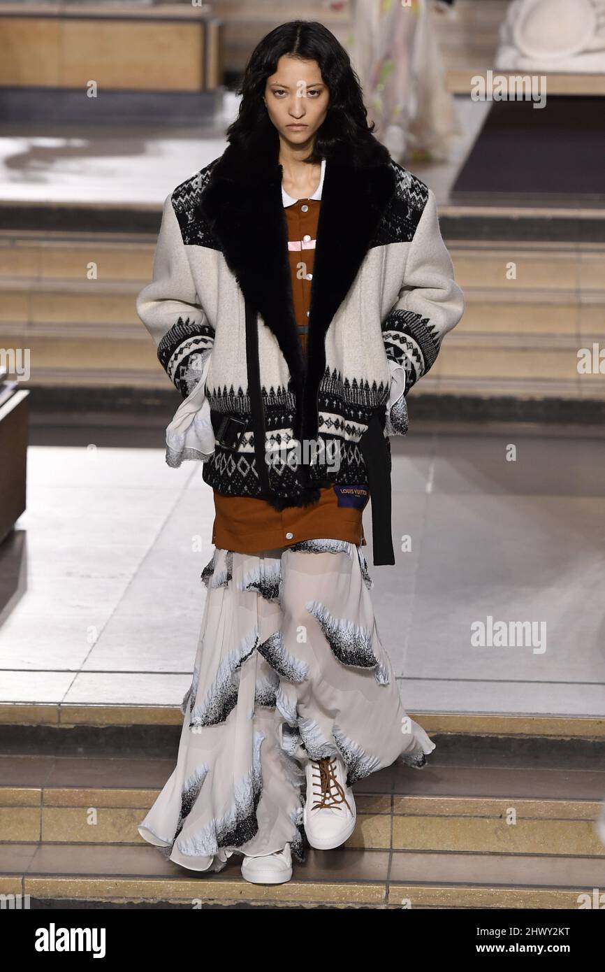 A model walks on the runway at the Louis Vuitton fashion show during Fall  Winter 2022 Collections Fashion Show at Paris Fashion Week in Paris, France  on March 7 2022. (Photo by