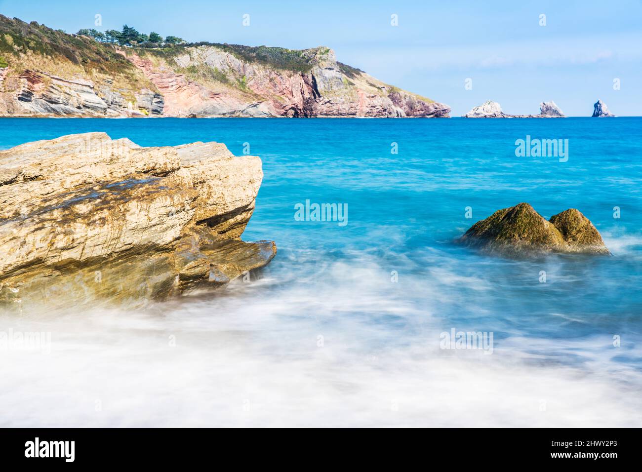 View from St. Mary's Bay towards Berry Head near Brixham in Devon.  Darl Rock, Mew Stone and Cod Rock are just offshore. Stock Photo