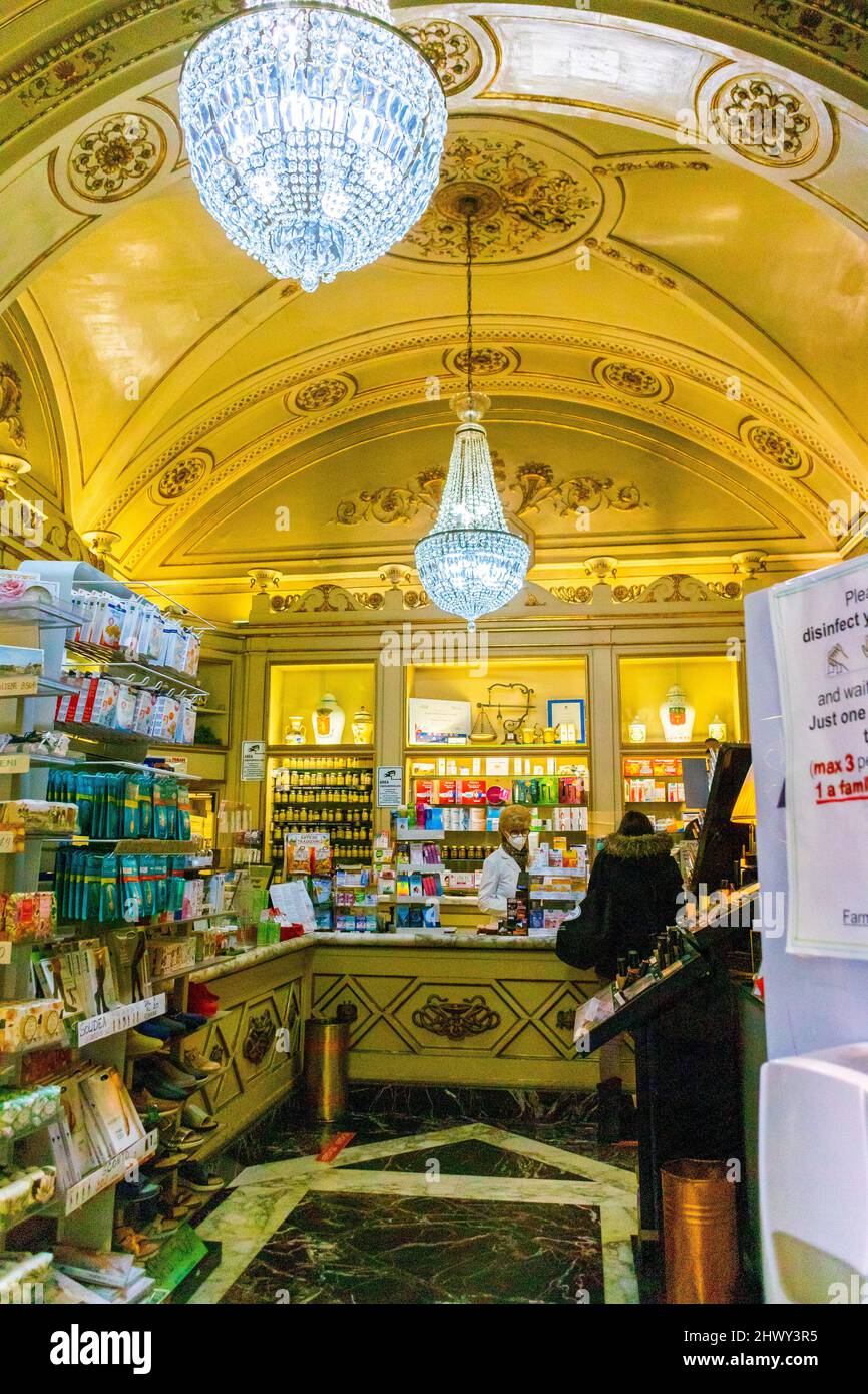 Florence, Italy, inside Traditional Pharmacy Shop in City Center, drug store, interior design vintage, chandeliers Stock Photo