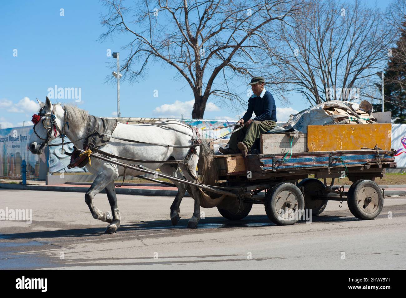 Sofia, Bulgaria. Around the local neighbourhood Hristo Botev inhabitants transport their good the old way: by horse and carriage. Stock Photo