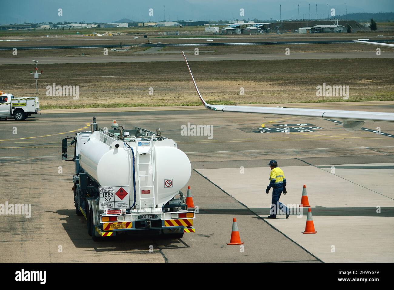 Passenger Jet getting refuelled, rising fuel prices, fuel crisis Stock Photo